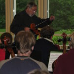 Ulrich Lewin bei der Leitung des Ehemaligenorchesters 2006 Ehemaligenorchester