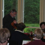 Ulrich Lewin bei der Leitung des Ehemaligenorchesters 2006 Ehemaligenorchester